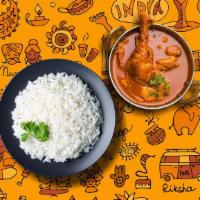 Railway Chicken Curry & Aromatic Basmati Rice · Tender morsels of chicken cooked in a classic brown curry with Indian whole spices, served w...