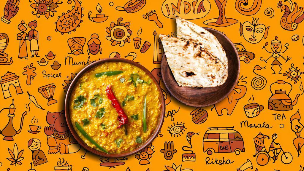 Daal Bright Lights & Tandoori Roti · Yellow lentils, cooked to perfection over a slow flame and tempered with 'ghee' and spices, served with a side of our aromatic basmati rice. Comes with a side of whole wheat flat bread baked to perfection in an Indian clay oven