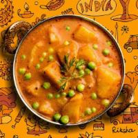 Potato & Peas · Peas and potatoes, simmered to perfection in an onion, tomato and Indian masala curry, serve...