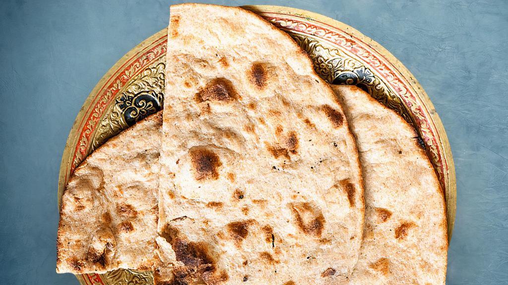 Roti Tandoori · #Bread#Grilled #Indian	Whole wheat flatbreads baked in our traditional clay oven, so soft that you won't miss your mom!