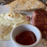 Corned Beef Hash · 2 eggs any style and rye toast.