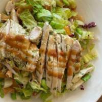 Asian Chicken Salad · Romaine, bean sprouts, mandarin oranges, edamame, crispy wontons, grilled chicken, almonds a...