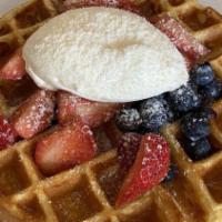 Belgian Waffle · Whipped creme fraiche, seasonal berries and maple syrup.