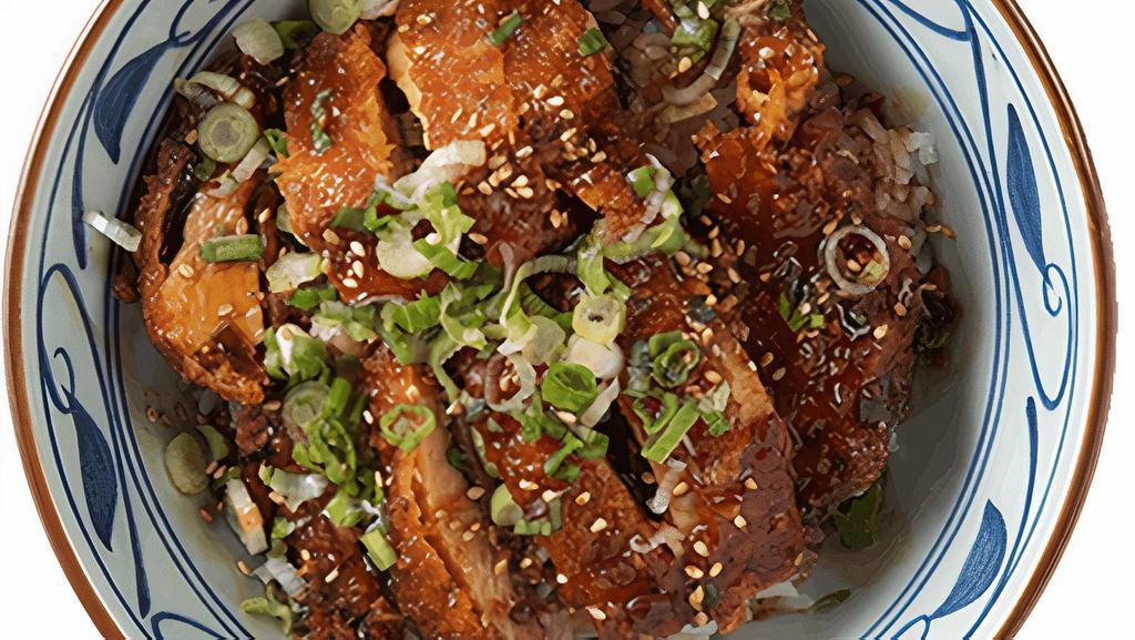 Chicken Teriyaki Bowl · House-made sweet mirin glaze on our big chicken katsu, served with your choice of steamed rice or udon noodles, topped with chopped scallions and toasted sesame seeds