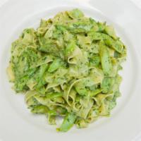 Pesto Genovese · Homemade fettuccine with creamy pesto and asparagus.