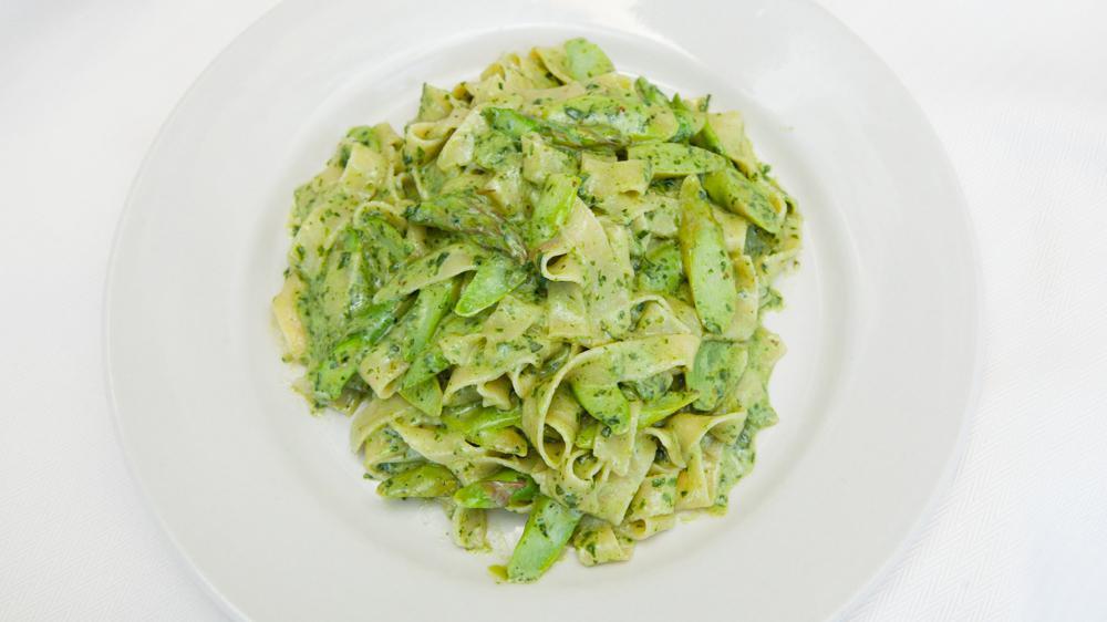 Pesto Genovese · Homemade fettuccine with creamy pesto and asparagus.