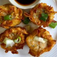 Thai Dumpling (6 Pieces) · Steamed or fried grounded chicken wrapped in wonton skin, steamed dumpling served with soy v...