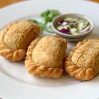 Curry Puff (3 Pieces) · Puff pastry stuffed with minced chicken, potato onion, and curry powder served with cucumber...