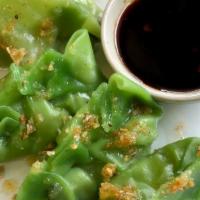 Vegetable Dumpling (6 Pieces) · Steamed or fried dumpling stuffed with American broccoli,corn, carrot, green pea, and spinac...