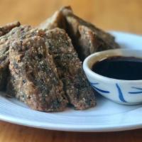 Chive Pancake (6 Pieces) · Fried chive pancake served with soy vinaigrette sauce.