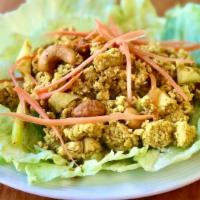Chicken Lettuce Wrap · Minced chicken with cashew nuts, carrot, and curry powder served with lettuce.
