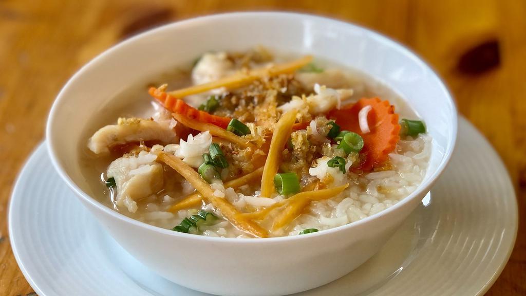 Ginger Rice Soup (Large 32 Oz) · Clear soup with Jasmine rice and fresh ginger topped with fried garlic and scallion.