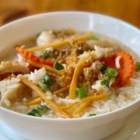 Ginger Rice Soup (Small 16 Oz) · Clear soup with Jasmine  rice and fresh ginger topped with fried garlic and scallion.