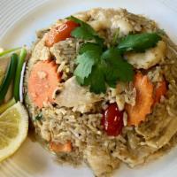 Thai Fried Rice · Stir-fried jasmine rice with egg, carrot, onion, tomato, and scallion flavored with a variet...