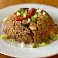 Tom Yum Fried Rice · Stir-fried jasmine rice with tom yum chili paste, onion, scallion, bell pepper, and mushroom...