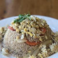 Crab Fried Rice · Stir-fried jasmine rice with real crab meat, egg, onion, scallion, carrot, and tomato flavor...