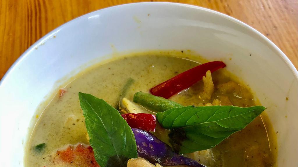 Green Curry · Green curry paste, coconut milk, eggplant, bamboo shoot, bell pepper, carrot, string bean, and fresh basil.