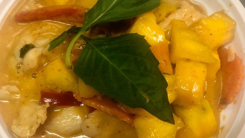 Mango Curry · Red curry paste, coconut milk, mango, bell pepper, carrot, and fresh basil.