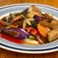 Eggplant Basil · Sautéed with eggplant, fresh basil leaves, onion, bell pepper, carrot, string bean, and chil...