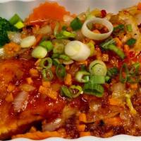 Pla Lard Prik · Pan-seared fillet Salmon  or  deep-fried fillet Tilapia with homemade sweet chili sauce and ...