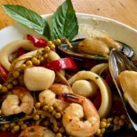 Pad Cha Seafood · Sautéed mixed seafood with bell pepper, fresh basil, fresh baby pepper, and galangal flavore...