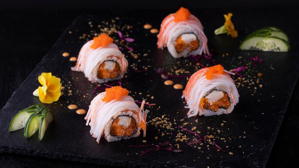 Tate Roll · Spicy Salmon and Cream Cheese Inside, Crab meat, Crunch and Spicy Mayo on Top.