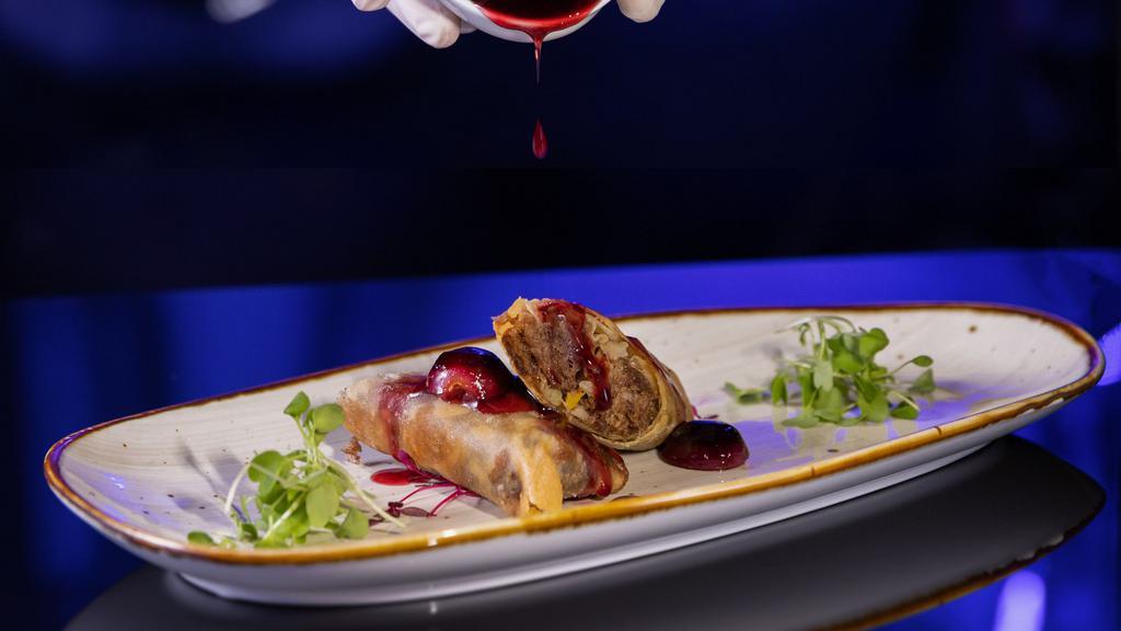 Duck Confit Spring Rolls · Dried Fruit, Apple, Charred Grape-Red Wine Sauce