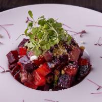 Porcini Beet Salad · Red wine braised red and golden beets, asparagus and porcini mushrooms.