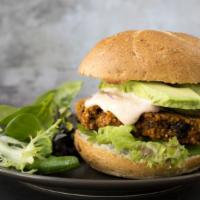 Vegan Burger With Avocado · Mouthwatering Impossible Burger served on a potato bun with Avocado, lettuce, tomato, pickle...