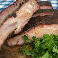 Shareable Ribs · Share a half rack or full rack with choice of small side. Choice of sauce on ribs.