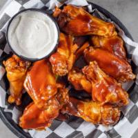 Bourbon Wings · Flambé' with bourbon and tossed in our homemade BBQ sauce, served with homemade ranch.