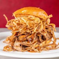 Bourbon Brisket · Topped with crispy onions and bourbon BBQ.