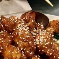 Sesame Chicken · Poultry in a sweet sauce served with sesame seeds.