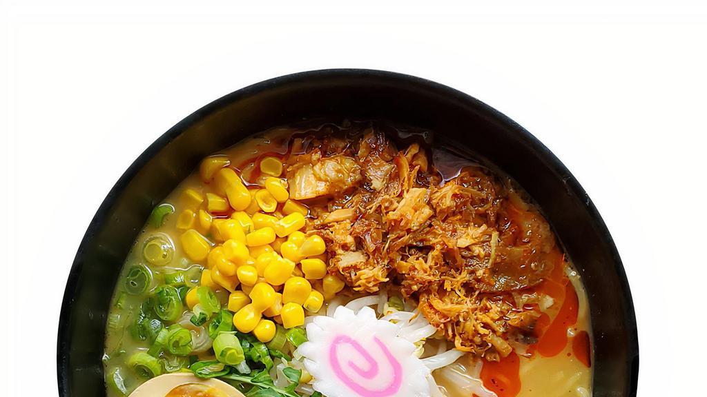 Spicy Pulled Pork Ramen · Miso based ramen with spicy pulled pork, marinated egg, corn, scallions, arugula, bamboo