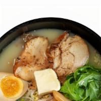 Okinawa Shio Ramen · Shio (salt)-based ramen with chicken chashu, marinated egg, arugula, green onions, bamboo, g...