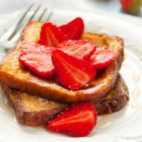 French Toast With Strawberries · Delicious, hot buttermilk pancakes cooked to perfection. Topped with fresh strawberries.