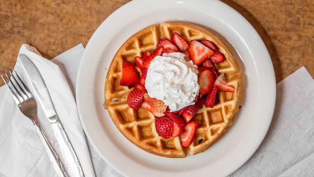 Belgian Waffle With Fresh Fruit · Fresh Strawberries, Blueberries or Banana, Topped with Whipped Cream.