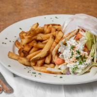 Chicken Gyro · Served on a Grilled Pita Bread, with Lettuce, Diced Tomato, Onions & Tzatziki Sauce.
