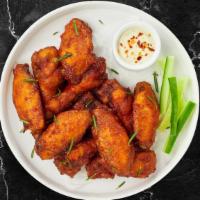 Crispy Golden Wings · Our famous wings fried until perfectly golden served plain. Served with your choice of sauce...