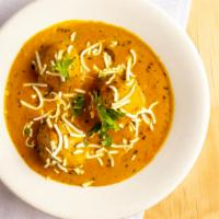 Malai Kofta · Vegetable dumplings cooked in cream based sauce. Served with rice, raitha and a pickle.