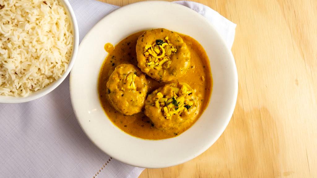 **New** Dum Aloo Kashmiri · Fried potatoes stuffed with spiced cottage cheese and nuts, finished in a rich onion and cream sauce.