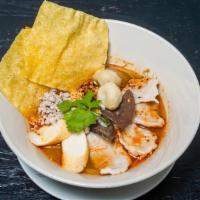 Tom Yum Noodle Soup · Sour and spicy soup with ground pork, fishball, bean sprout and ground peanut.
