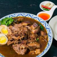 Stewed Pork Leg / ข้าวขาหมู · Served with boiled eggs, chinese broccoli and pickled cabbage serve with jasmine rice.