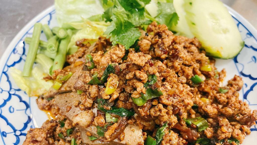 Larb Neua / ลาบเหนือ · (northern thai food) spicy minced pork, shallot, mint leaves, scallion, cilantro and special chili paste that make food delicious.