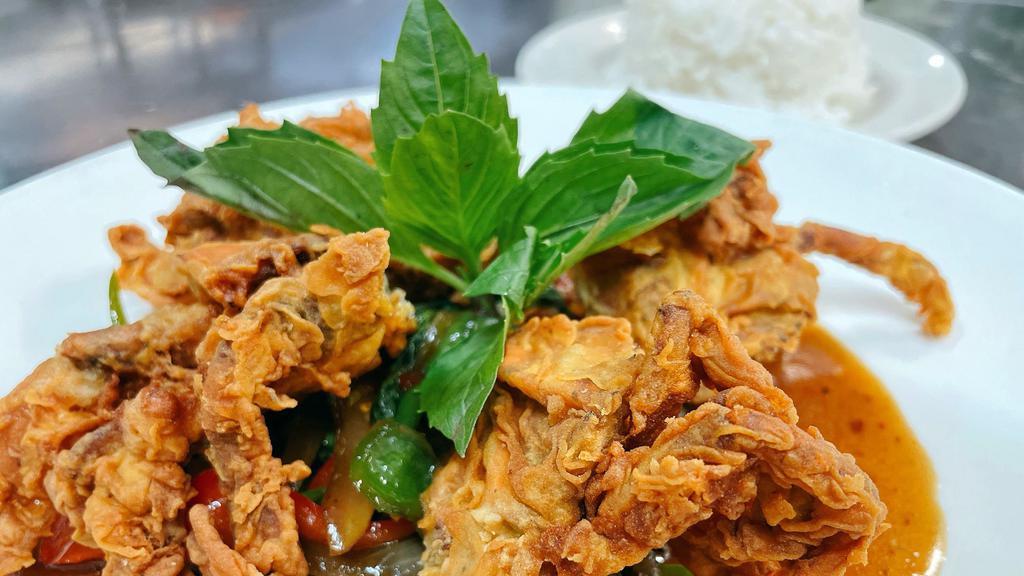 Soft-Shell Crabs Basil · Crispy soft-shell crab sautéed with onion, pepper and basil in chili sauce serve with jasmine rice.