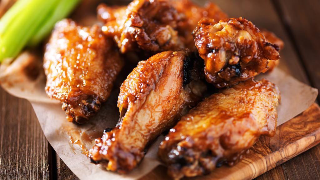 Jumbo Wings · Mouthwatering house chicken wings, fried to a perfect crisp and smothered in customer's choice of wing flavor. Served in your choice of style and dipping sauce.
