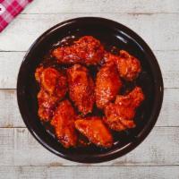 Flamin' Bbq Wings (8 Pieces) · The flaming wings! These, out of this world wings are smothered in our house made roasted ba...