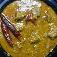 Lamb Kolhapuri · Gluten-Free. Chunks of lamb cooked with vinegar, hot chilies and kolhapuri spices.