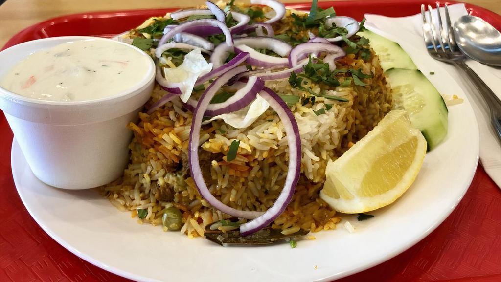 Lamb Biryani · Gluten-Free. Basmati rice with tender pieces of lamb and spices.