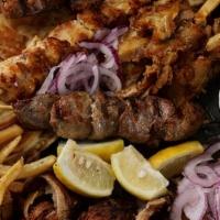 Mixed Grill Plate For 4 · A combination Plate which includes: Chicken Yeero, Pork Yeero, Beef Kebab, Loukaniko, Beef a...